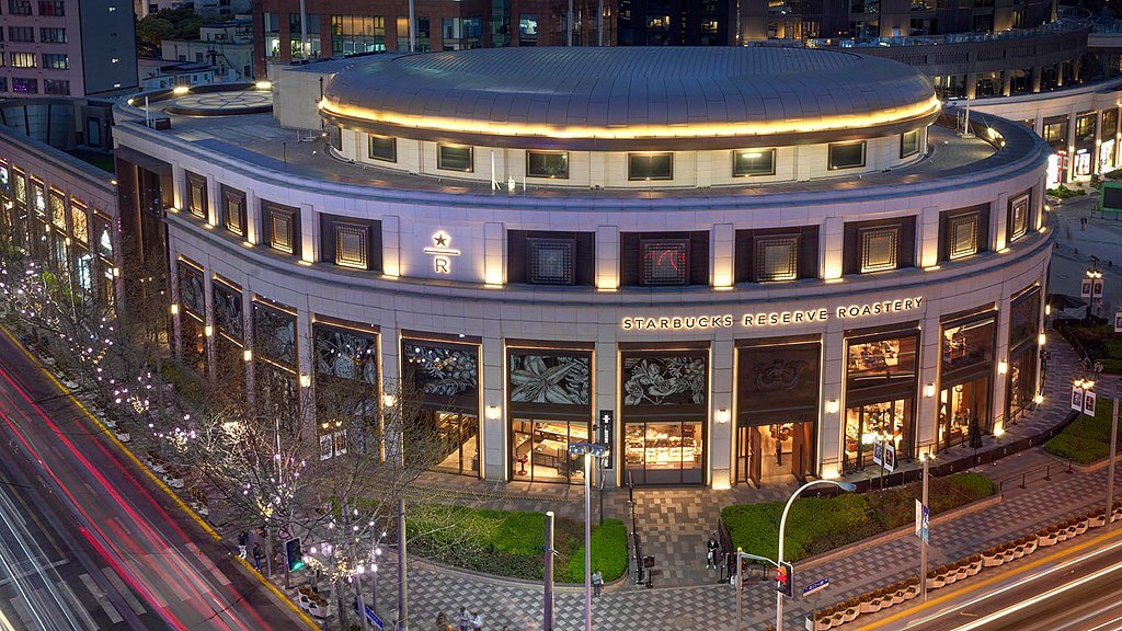 Photograph of the outside of the Starbucks Reserve Roastery at HKRI Taikoo Hui, Shanghai. Credit https://en.wikipedia.org/wiki/File:Starbucks_Reserve_Roastery.jpg