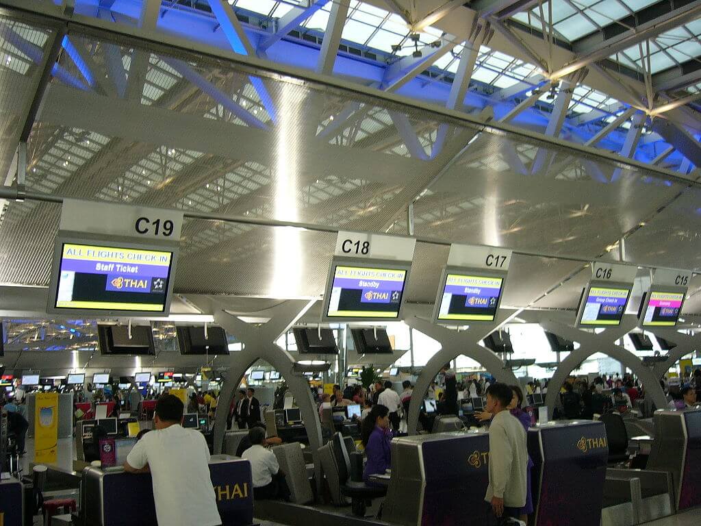 Thai Airways check-in counters at Suvarnabhumi International Airport passenger terminal, Thailand. Credit https://en.wikipedia.org/wiki/File:VTBS-Thai_Airways_Check-in_counters.JPG