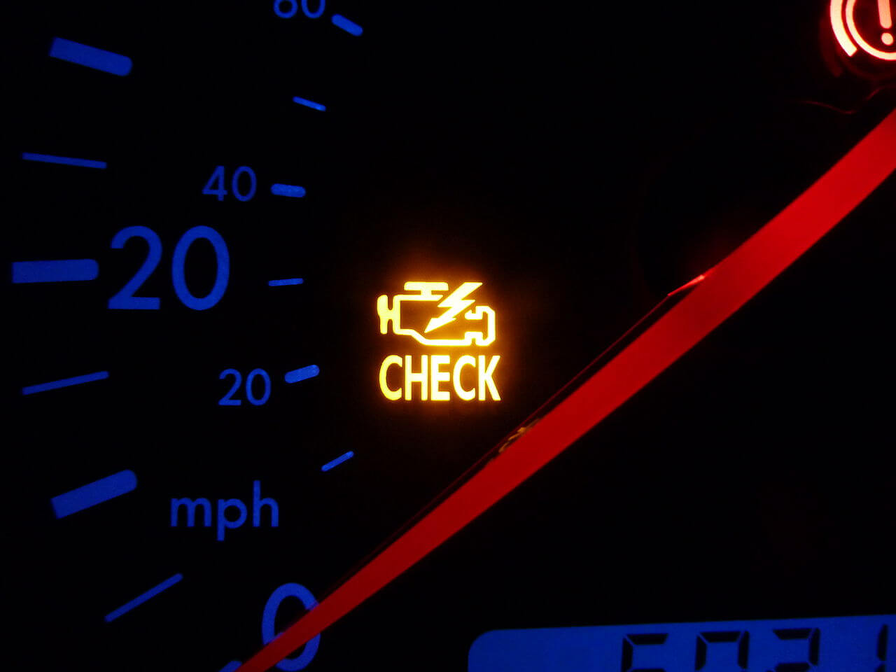 Engine check light on a VW Bora indicating a fault in the engine management system. Credit: https://commons.wikimedia.org/wiki/File:Vw_engine_check.jpg